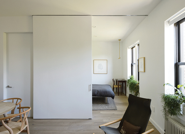 spare_change-seamless_sliding_door-master_bedroom-living_room